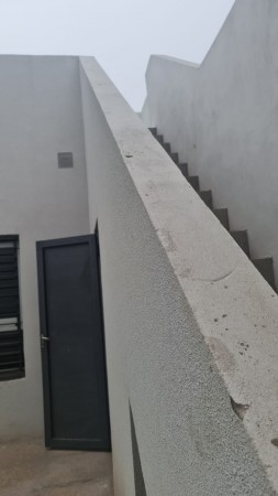 VENTA O PERMUTA Casa al frente a estrenar - Dos dormitorios - Amplio patio con parrilla - Terraza - Barrio Belgrano. APTA CREDITO