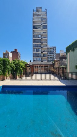Alquiler Departamento premium. Dos dormitorios. Cochera. Amenities. España y Pellegrini